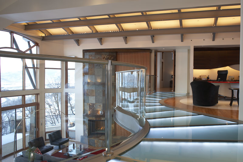 Interior upper level led glass floors with glass metal railing 