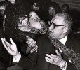 Belly dancer Shareffa Saleh goes through her routine while Detroit Mayor Coleman A. Young gestures during a dinner in the Greektown section of Detroit. The city was in its second day of hosting the Democratic National site inspection committee, March 1983
