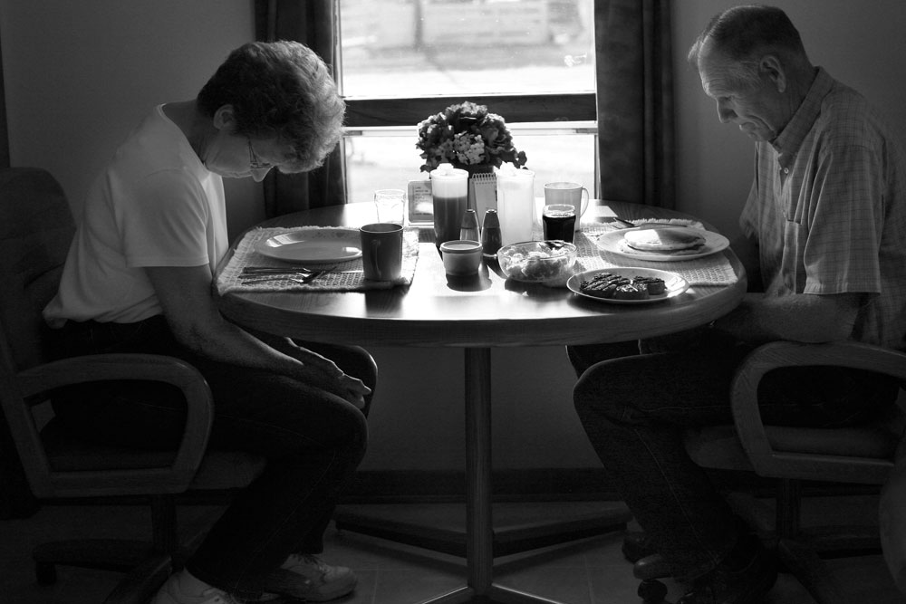 The Grants eating breakfast on their farm in Meadow Grove, Nebraska. Rich and Carol are semi-retired hog farmers who have lived in this area their whole lives. Carol made fluffy pancakes, eggs, and pork sausage from their sons' pork.Photos taken for the Breakfast issue of Saveur.