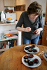 Rolli Lucarotti eating sea urchins in her home in Ajaccio's old city.