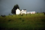 A farm house on a rainy day in northeast Nebraska.