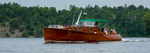 The wooden boat, Zipper, cruises the 1000 Islands