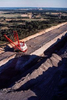 Aerial image of a Bucyrus Erie walking dragline excavating at the Winfield lignite coal strip mine near Interstate 30 and Mt. Pleasant, Texas. The mine and the Monticello Power Plant that it fed have now been closed. it fed have now been closed.