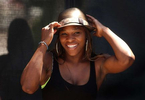 4/16/2004: Serena Williams didn't play tennis Friday, but she was on hand to donate some money to charity and to cheer for his sister Venus at the Family Circle Cup in Charleston. CHRISTOPHER A. RECORD - STAFF PHOTO