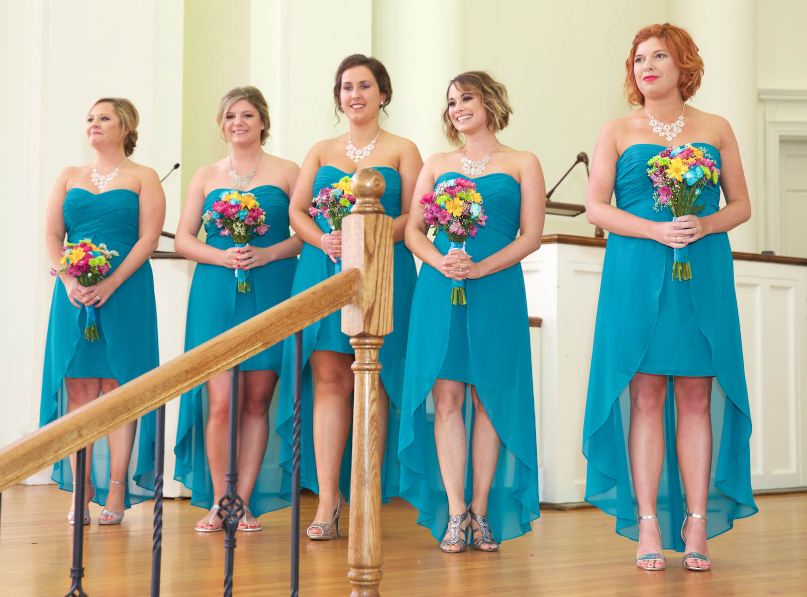 Bridesmaids wait for Alissa to come down the aisle. Wedding pictures by Tiffany & Steve of Warmowski Photography. 