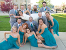 The wedding party tries a pose, outdoor portaits in downtown Jacksonville. Wedding pictures by Tiffany & Steve of Warmowski Photography.