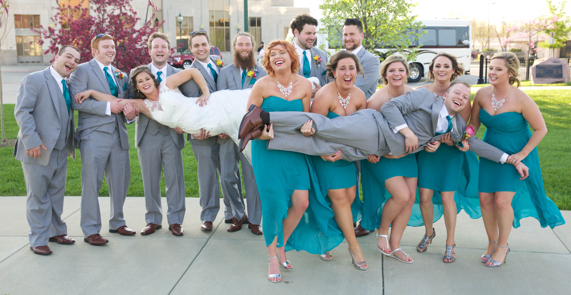 Wedding party tries a different pose, outdoor portaits in downtown Jacksonville. Wedding pictures by Tiffany & Steve of Warmowski Photography.
