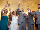 Toasting in the VIP room at Hamilton's 110 North East. Wedding pictures by Tiffany & Steve of Warmowski Photography.