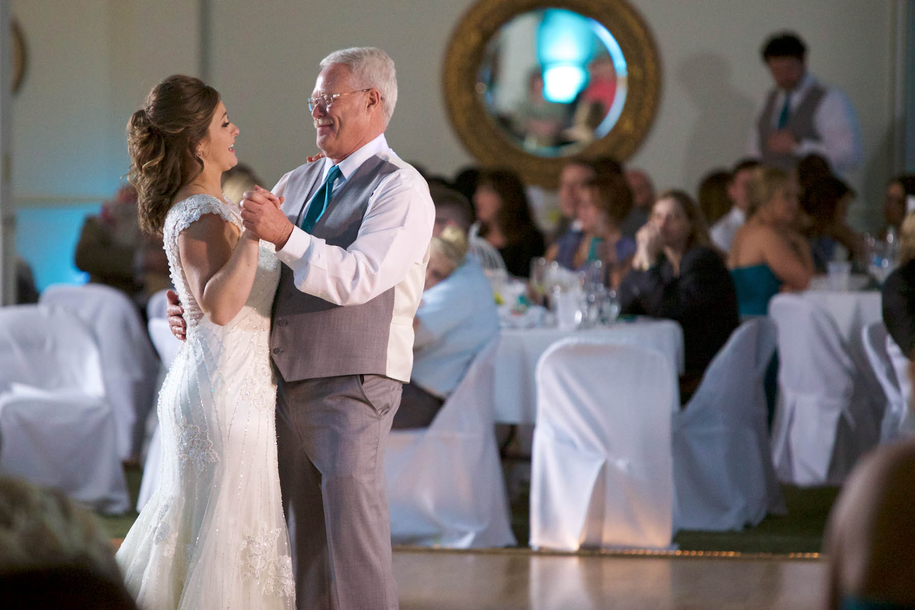 Alissa with her father during first dances. Wedding pictures by Tiffany & Steve of Warmowski Photography.