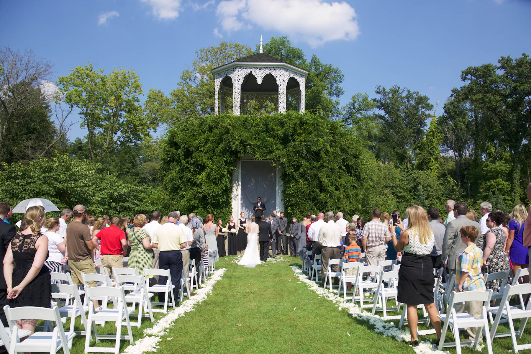Outdoor wedding ceremony of Jaclyn & Scott, Allerton Park, Monticello. Wedding photography by Tiffany & Steve of Warmowski Photography.