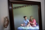 Stephanie shares some time with her mom, Brenda in her room.