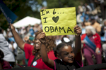 August 21, 2012 - COLUMBUS, OH:  A young girl holds up a sign read {quote}I'm 6…I (heart) OBAMA{quote} during a campaign event in Columbus, OH. (Scout Tufankjian for Obama for America/Polaris)