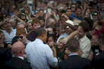 August 28, 2012- Fort Collins, CO:  A young girl grins up at President Barack Obama at a campaign event in Fort Collins, CO.  (Scout Tufankjian for Obama for America/Polaris)