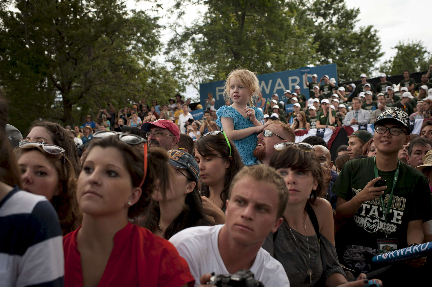 August 28, 2012- Fort Collins, CO:  A young girl listens as President Barack Obama speaks at a campaign event in Fort Collins, CO.  (Scout Tufankjian for Obama for America/Polaris)