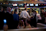 September 1, 2012 - Sioux City, IA: President Barack Obama greets patrons at Bob Roe's Point After sports bar in Sioux City, IA.  (Scout Tufankjian for Obama for America/Polaris)