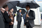 September 26, 2012 - Kent, OH: President Barack Obama greets supporters in the rain after disembarking from Air Force One for a campaign event in Kent, OH. (Scout Tufankjian for Obama for America/Polaris)