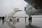 October 5, 2012 - Cleveland, OH- Air Force One and ground staff at Hopkins Airport in Cleveland attempt to line the steps up with Air Force One on a rainy day. (Scout Tufankjian for Obama for America/Polaris)