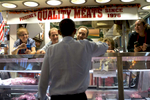 October 5, 2012 - Cleveland, OH- President Barack Obama chats with the proprietors of Pinzone's Quality Meats during a visit to the Cleveland West Side Market Cleveland, OH.  (Scout Tufankjian for Obama for America/Polaris)