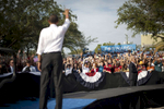 October 25, 2012 - Tampa, FL:  President Barack Obama waves to supporters after a rally in Tampa's Centennial Park during a 48 hour straight swing of campaign events. (Scout Tufankjian for Obama for America/Polaris)