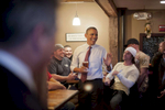 October 27, 2012 - Merrimack, NH:  President Barack Obama jokes around with patrons at the Common Man Pub in Merrimack, NH.  (Scout Tufankjian for Obama for America/Polaris)