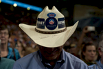 November 1, 2012 - Boulder, CO:  A supporter wears a cowboy hat signed by Michelle Obama at a rally for President Barack Obama in Boulder, CO a few days before the 2012 election. (Scout Tufankjian for Obama for America/Polaris)