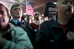 November 2, 2012 - Hilliard, OH: A woman waves a flag as she listens to President Barack Obama speak at a rally in the small town of Hilliard, OH a few days before the 2012 election.  (Scout Tufankjian for Obama for America/Polaris)