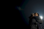 November 5, 2012 - Des Moines, IA:  President Barack Obama and First Lady Michelle Obama embrace onstage during his last ever campaign event the night before the 2012 election. (Scout Tufankjian for Obama for America/Polaris)