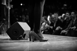 March 13, 2014.  PARIS, FRANCE- The MC at mayoral candidate Anne Hidalgo's big rally at Paris' historic Cirque d'Hiver wears fabulous shoes.  For the first time in France's history, Paris will have a woman as a mayor - either Socialist Anne Hidalgo or Center-Right Nathalie Kosciusko-Morizet.  Photo by Scout Tufankjian