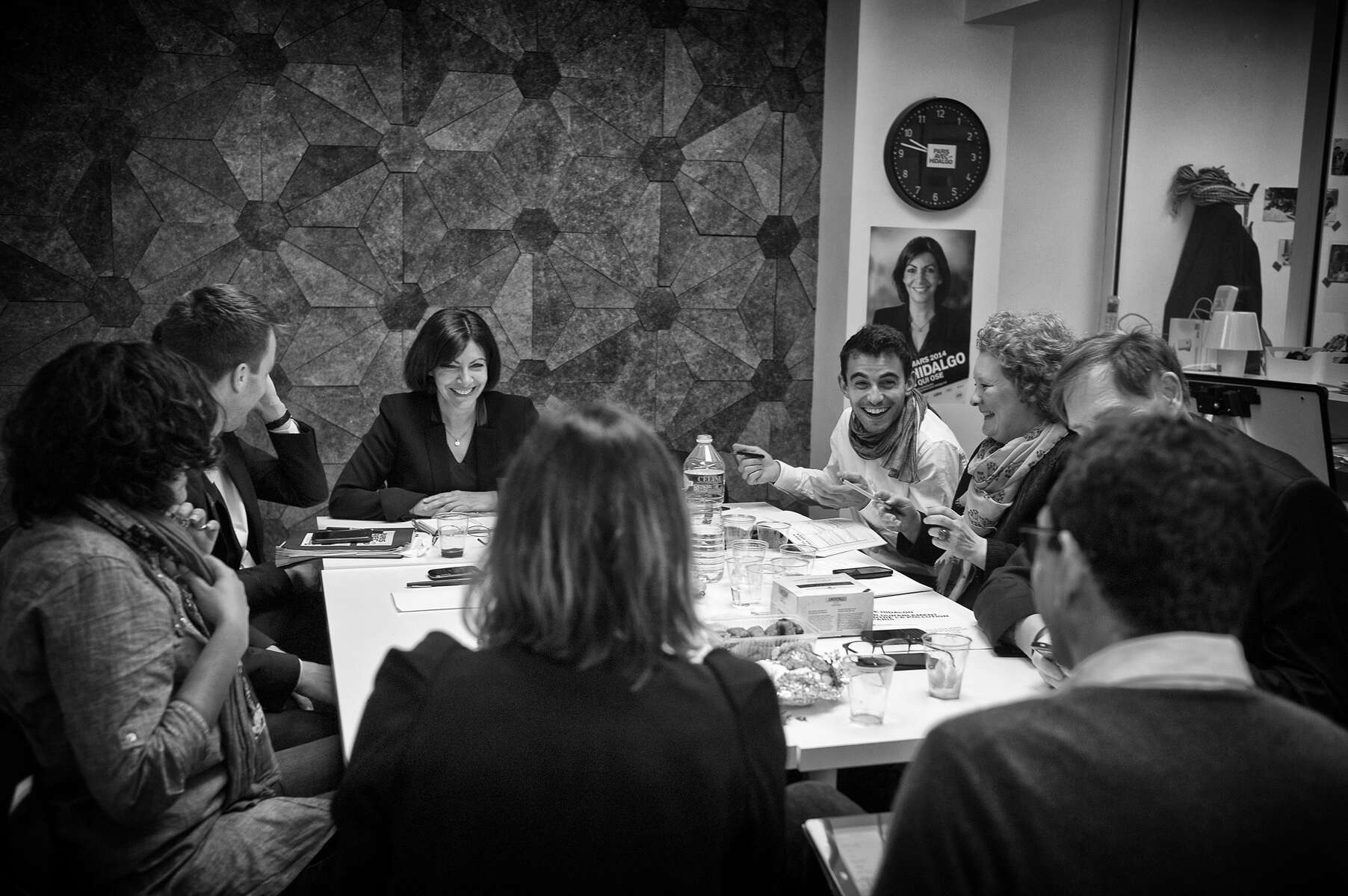 March 17, 2014.  PARIS, FRANCE- Mayoral candidate Anne Hidalgo meets with senior staff in her campaign's headquarters in Paris' Bastille neighborhood, including spokespeople Myriam El Khomri and Bruno Julliard, campaign co-directors Remi Feraud and Jean-Louis Missika (around Hidalgo), press liaison Hervé Marro, campaign coordinator Alexandra Cordebard, communications expert Philippe Grangeon, director of staff Jean-Marie Vernat, chief of staff Laure Moline, and advisor Elisa Yavchitz.   For the first time in France's history, Paris will have a woman as a mayor - either Socialist Anne Hidalgo or Center-Right Nathalie Kosciusko-Morizet.  Photo by Scout Tufankjian
