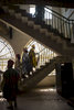Mustafa Abba (yellow), the Emir of Kano's younger brother and personal secretary walks with his aides to his office in the palace in Kano, Nigeria 