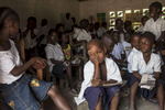 Students in an unsupervised classroom after the teacher went home sick at the Passama Public School in Gbarnga, Bong County, Liberia 