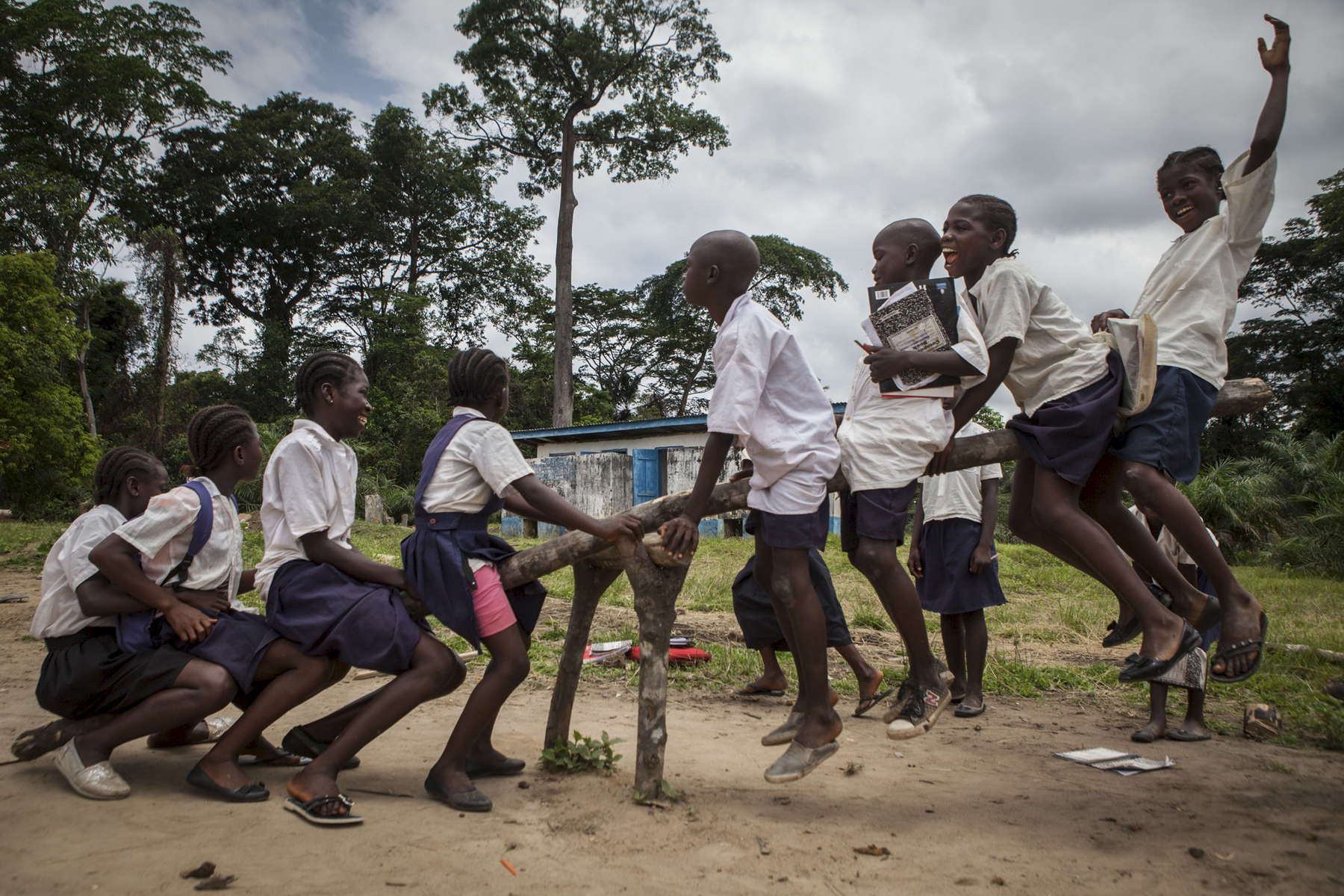 Students play on the playground at the Passama Public School in Gbarnga, Bong County, Liberia