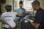 Karen Daniels, a nurse from Samaritan's Purse, draws blood from an ebola survivor with the help of Dr. Ian Crozier at the Kissy United Methodist Church Eye Hospital in Freetown, Sierra Leone. 