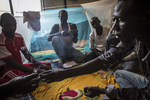 Ex-Boko Haram combatants play cards in a dormitory in an internment camp in Goudoumaria, Niger, August 2018.