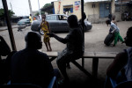 Men gather in Koumassi- Abidjan, Ivory Coast