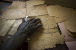 A librarian displays an astronomy manuscript at the Manuscript Library in Timbuktu, Mali on Monday, January 9, 2017. While Timbuktu was occupied, scores of manuscripts were destroyed but through an international effort, the majority of manuscripts were smuggled out of the city and saved. 
