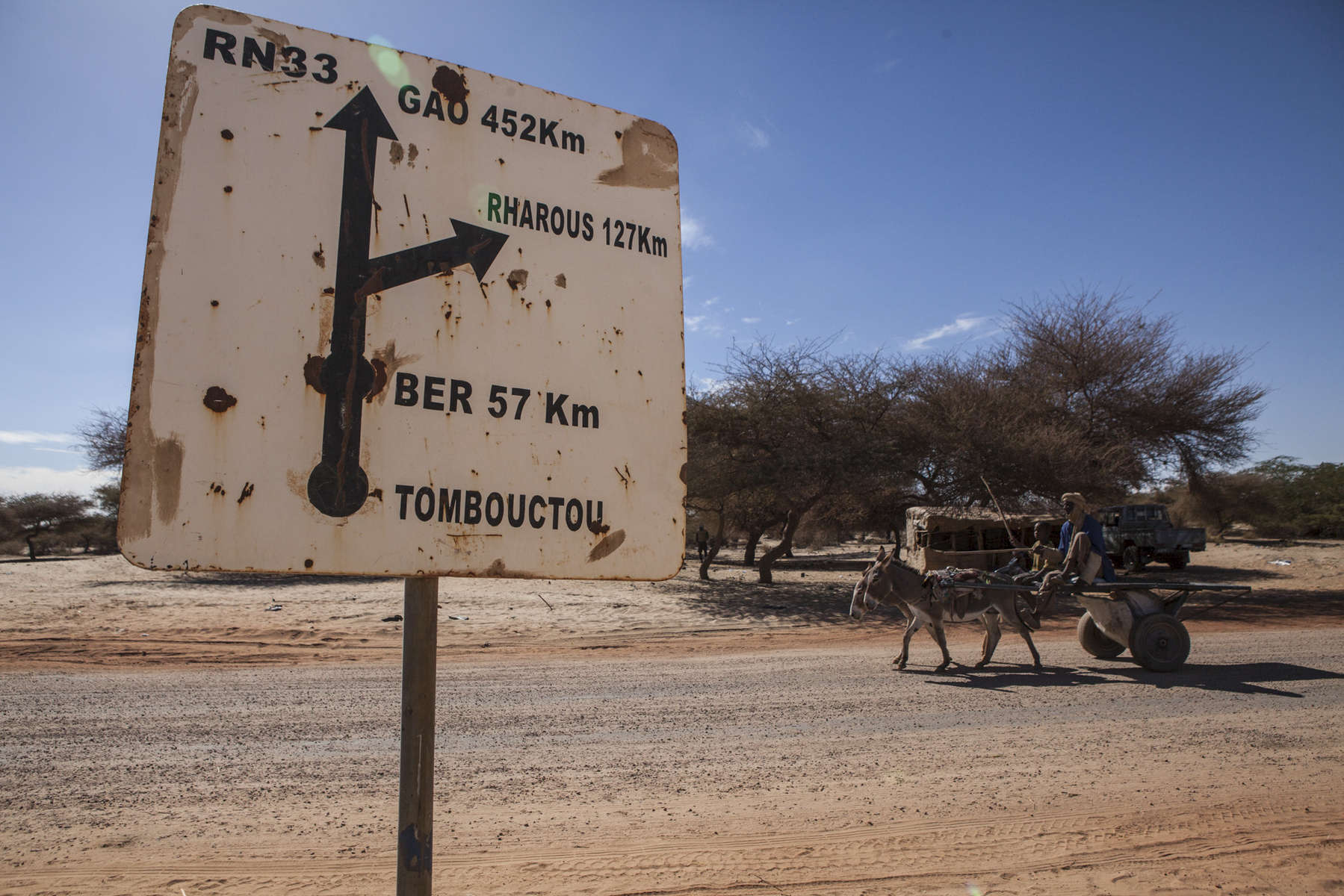 A sign post measuring the distance between Timbuktu and other northern towns on the outskirts of Timbuktu, Mali on Tuesday, January 10, 2017.