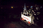 The Rwandan Battalion of the United Nations Peacekeepers patrols the perimeter of the Protection of Civilians (POC) site and the United Nations Mission in South Sudan (UNMISS) compound during a night patrol in Malakal, South Sudan on Monday, July 11, 2016. The UN has assured the displaced people that increased security measures around the camp will protect them from any further attack. Most of the displace are not convinced. The Malakal POC site houses over 32,000 displaced people mainly from the Shilluk and Nuer tribes. In February of this year, members of the Dinka tribe, who resided in the camp at the time, carried out a coordinated attack within the site leading to the destruction of hundreds of shelters and many deaths. Since then, most members of the Dinka tribe have fled to Malakal town where they occupy the homes of those still displaced. 