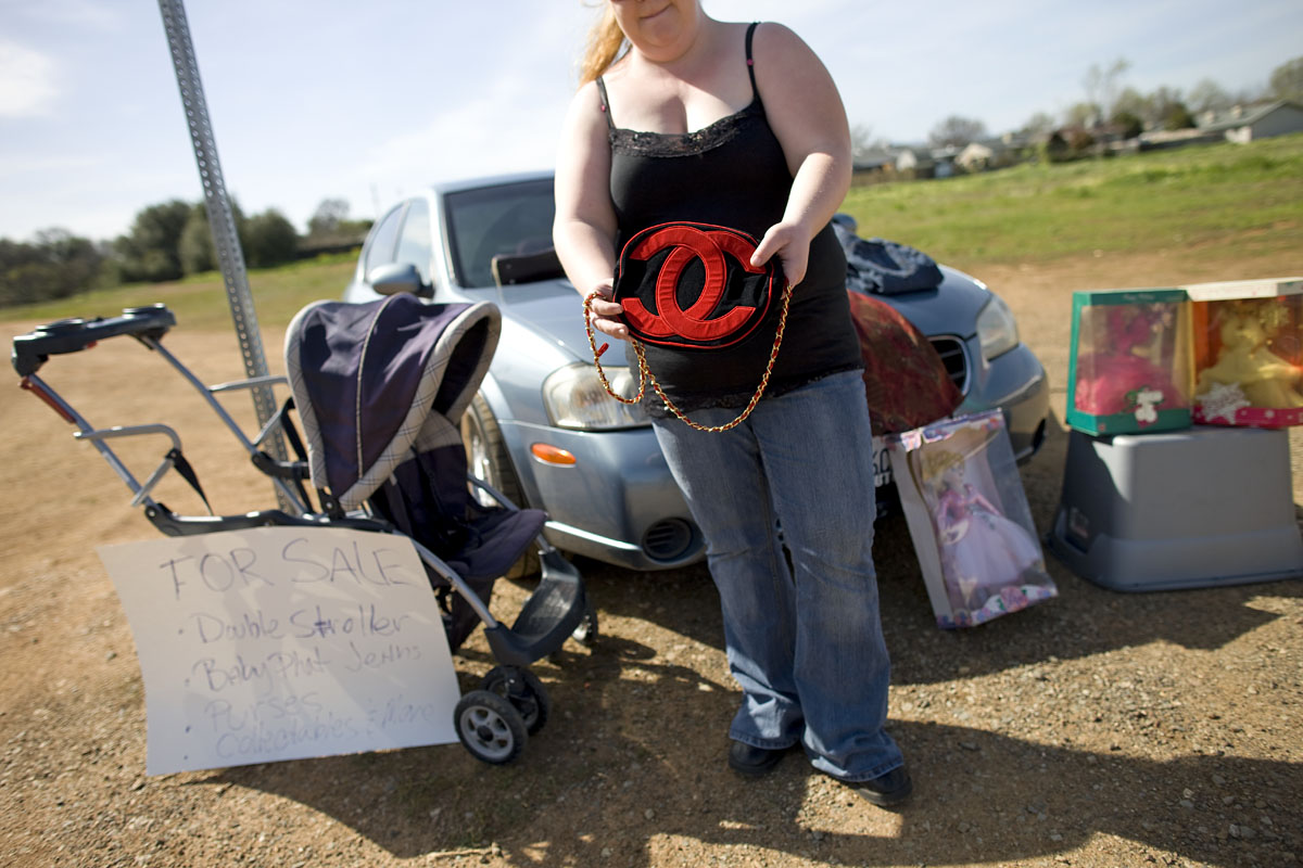 Jennifer Trisdale sells her designer Chanel purse on the side of California's I5 highway to help pay her bills.Anderson, CA.
