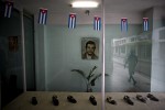A portrait of Che Guevara adorns a display of shoes in Camaguey, Cuba.