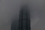 The top of Shanghai's World Financial Centre seen during a heavily polluted day. Air pollution is a major environmental issue in fast developping economies such as China. {quote}Air pollution can increase the impact of climate change as heavy air pollution can worsen droughts and flooding simultaneously in different regions by strongly affecting cloud effects{quote} according to scientists from the University of Maryland. Photo by @hessekatharina#shanghai#climatechangeisreel #climatechange#airpollution #smog#katharinahesse #china#金茂大厦