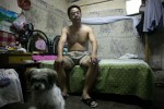 August 2007 : Mr X, a worker without a registration ( hukou) , spends the last days in his modest apartment before he decides to look for another refuge. ( his home was demolished later on )