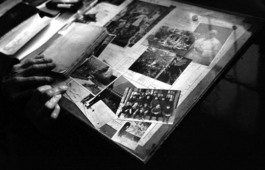 An “official” bishop shows an album with photos of fellow clerics, most of who have passed away. Like him, they were persecuted during the Cultural Revolution and some became “official” under pressure from the government. However, the bishop maintains that as the clerics were ordained before 1949, they were all loyal to RomeHebei province