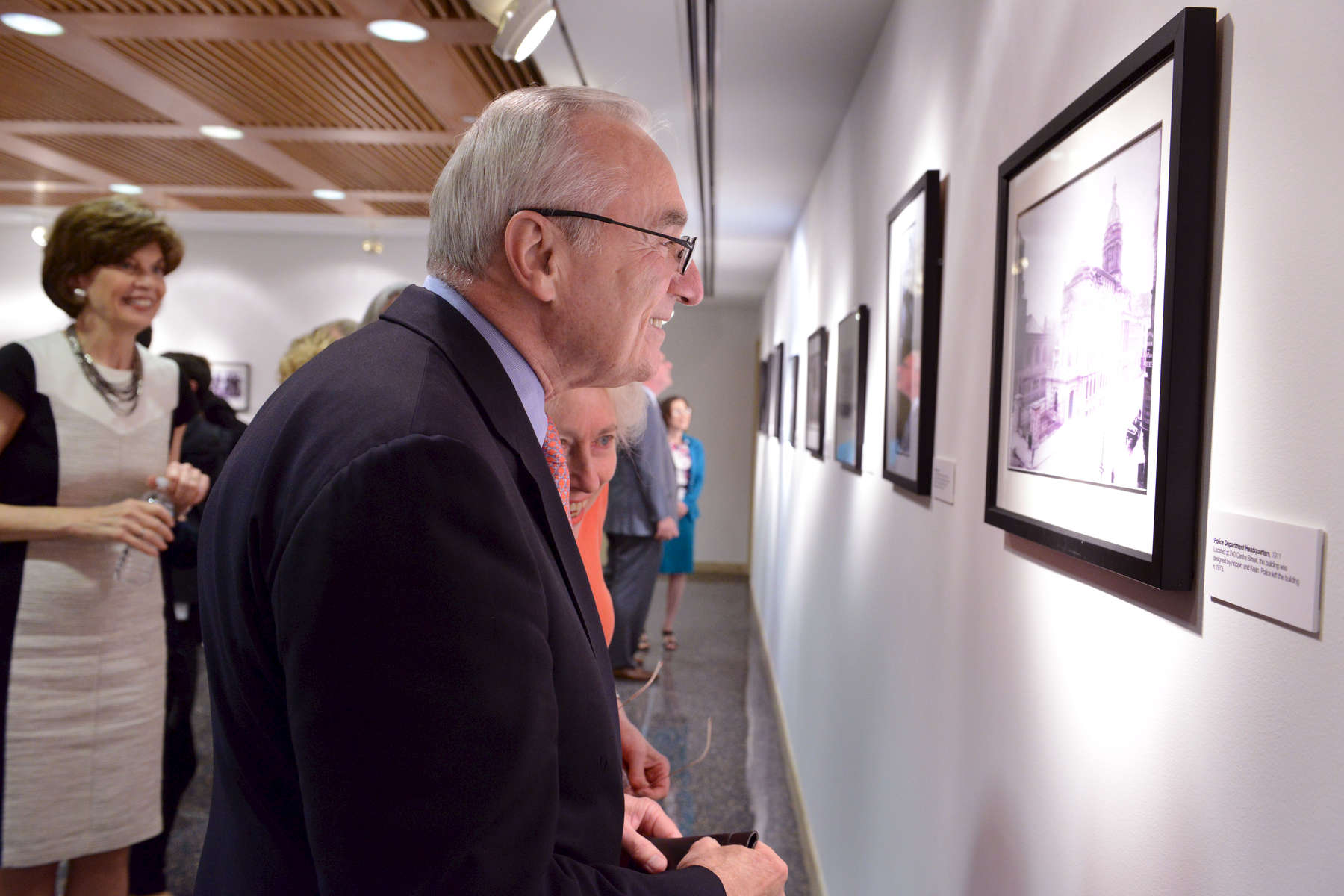 NYPD Police Commissioner William Bratton views an exhibit {quote}A Photographic History of the N.Y.P.D.{quote} which opened on Monday June 9, 2014 at the Eastern District Courthouse Charles Sifton Gallery. At left is EDNY Chief Judge Carol Amon.