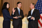 Mayor Michael Bloomberg swears in newly appointed Family Court Judge Dean Kusakabe, while his wife Kaori holds the Bible.Emigrant Industrial Savings Bank. February 6, 2014