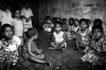 Jaffna, Sri LankaChildren sit on the floor of the orphanage in Jaffna. There are few orphanages which number few hundred children.