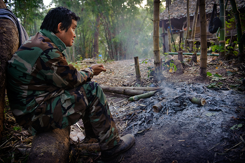 Colonel Ner Dah Mya, commander of the 201 bataglion of the KNLA army looks on while planning the partol route to reach the Neapeta village which was recently attacked by the Burmese forces.Colonel Ner Dah is one of the two sons of the legendary KNU leader Saw Bo Mya who died on 23 December 2006 of the heart attack.