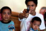 Two households, both alike in dignity... From ancient grudge break to new mutiny. ShakespeareDodz Surak points his gun as a sign of his determination to defend his family. Several years ago his family entered blood feud as his cousin was killed while trying to negotiate reconciliation between two feuded families in area of Cotabato city in Mindanao. Subsequently Dodz and his family killed several members of the rival family. In fear of retaliation Dodz always carries not only a hand gun but also M16 rifle and ammunition. He has never been arrested for killing of the rival family members.