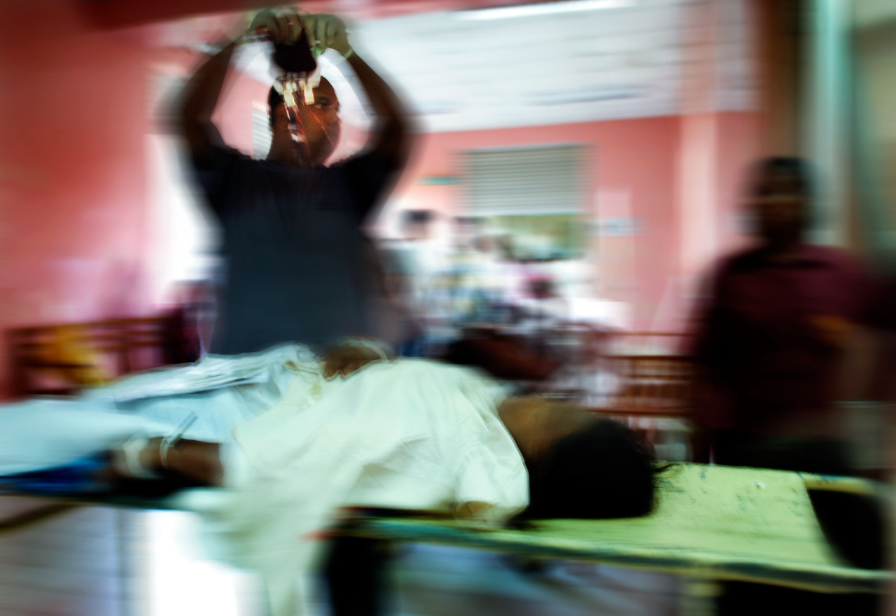 Injured woman from Muttur is attended by medical staff at Trincomalee hospital. Fierce fighting between LTTE rebels and Security forces in eastern town of Muttur left scores of killed and injured. This was the first batch of injured to be evacuated by the International Red Cross from besieged town of Muttur.