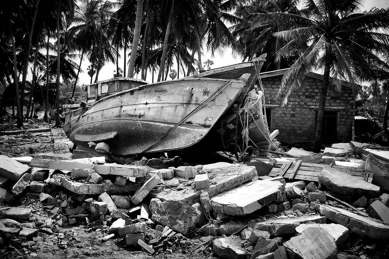 Valvettithurai, Jaffna.A boat lay amid destroyed houses bu the Tsunami.